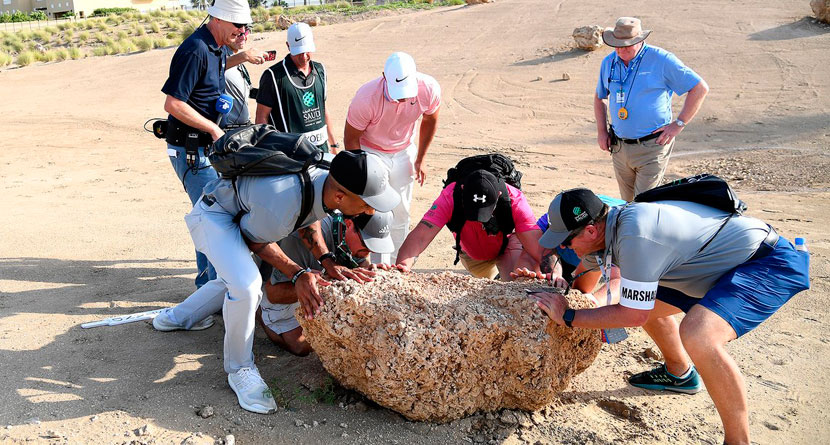 Koepka Gets Fans To Move Boulder